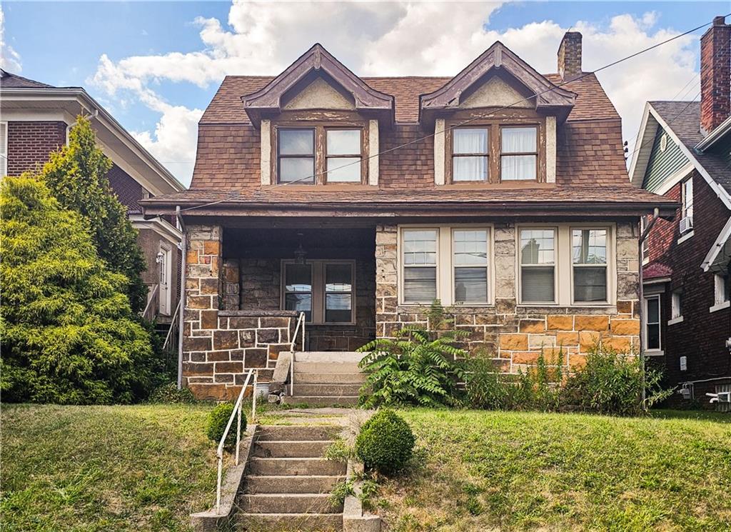 3254 Wainbell Avenue Pittsburgh, PA 15216 - Photo 1 of 11 front view of a house with a yard
