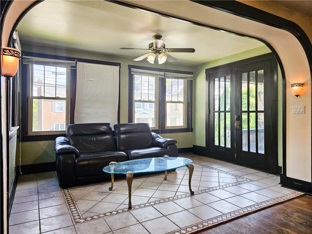 3254 Wainbell Avenue Pittsburgh, PA 15216 - Photo 2 of 11 a living room with furniture and a window