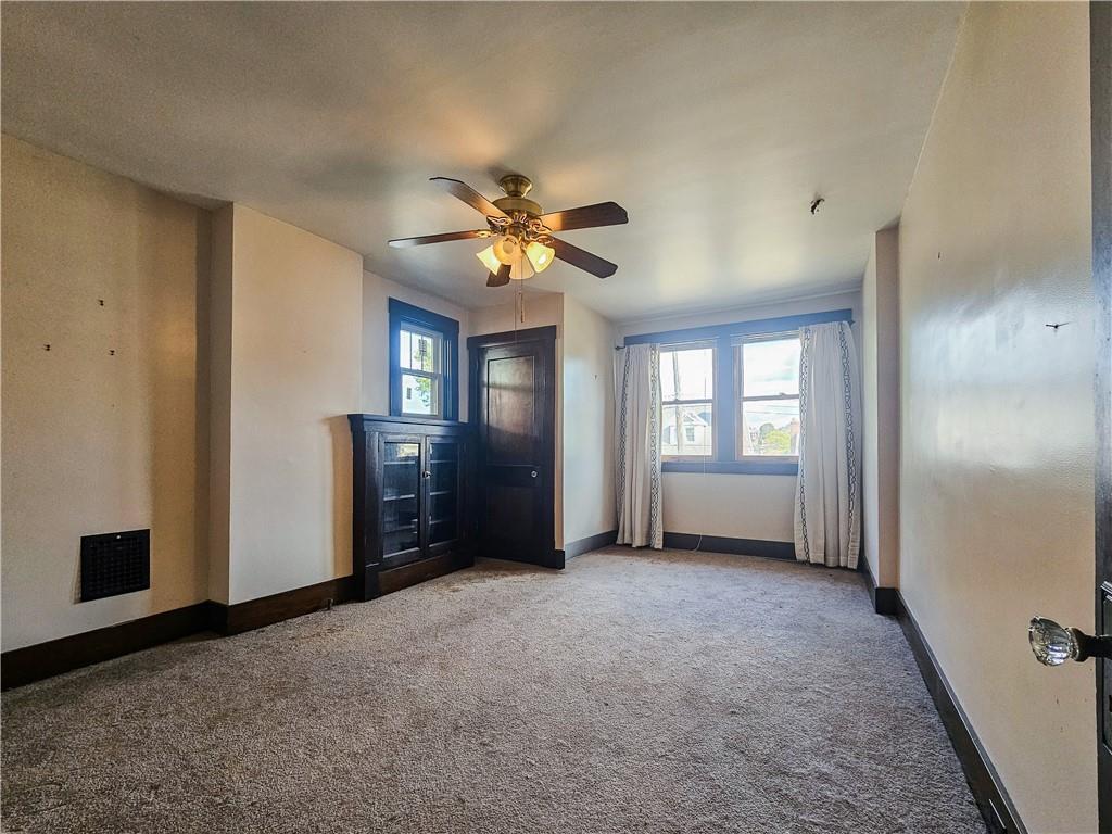 3254 Wainbell Avenue Pittsburgh, PA 15216 - Photo 7 of 11 a view of an empty room with a window