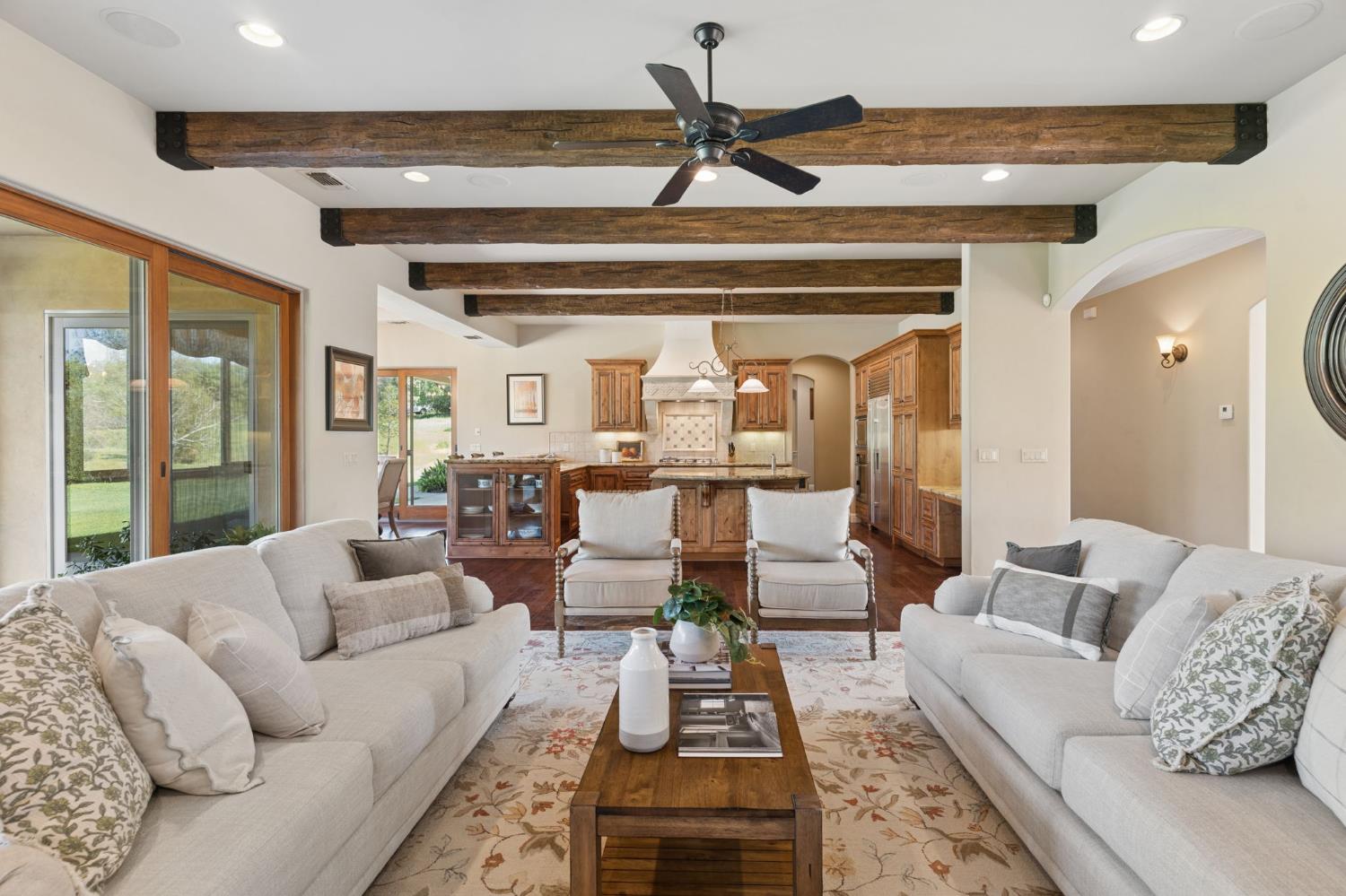 5180 Remuda Court Shingle Springs, CA 95682 - Photo 13 of 88 a living room with furniture and a chandelier