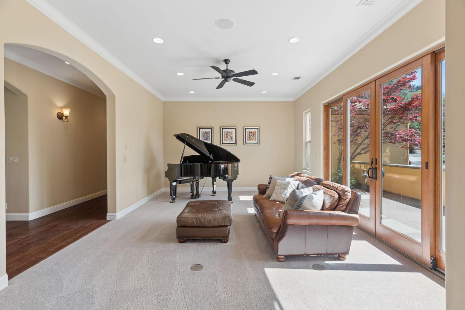 5180 Remuda Court Shingle Springs, CA 95682 - Photo 25 of 88 a living room with furniture and a chandelier