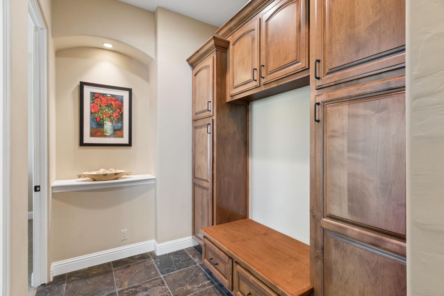 5180 Remuda Court Shingle Springs, CA 95682 - Photo 37 of 88 a kitchen with stainless steel appliances granite countertop a refrigerator and a sink