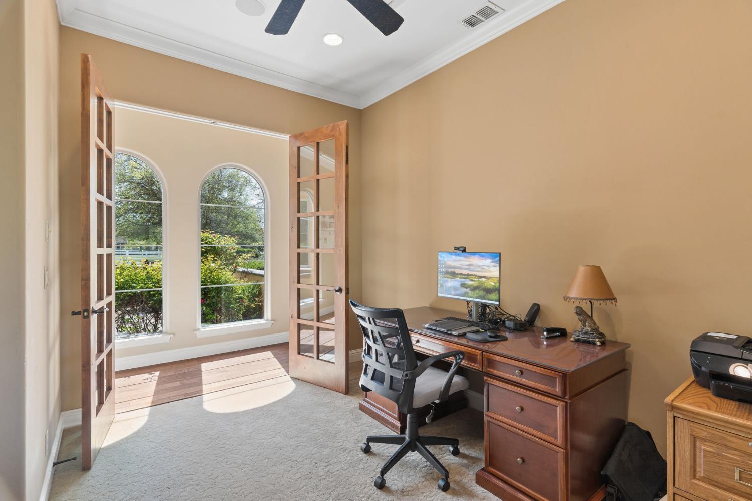 5180 Remuda Court Shingle Springs, CA 95682 - Photo 42 of 88 a view of a workspace with furniture and a window