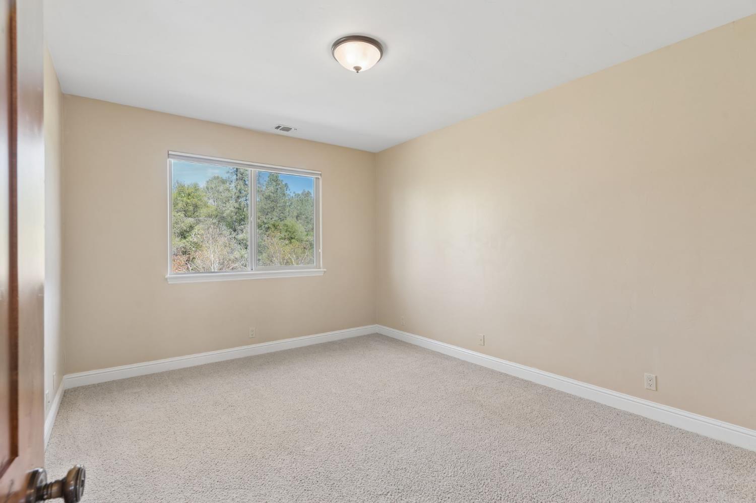 5180 Remuda Court Shingle Springs, CA 95682 - Photo 52 of 88 an empty room with a window