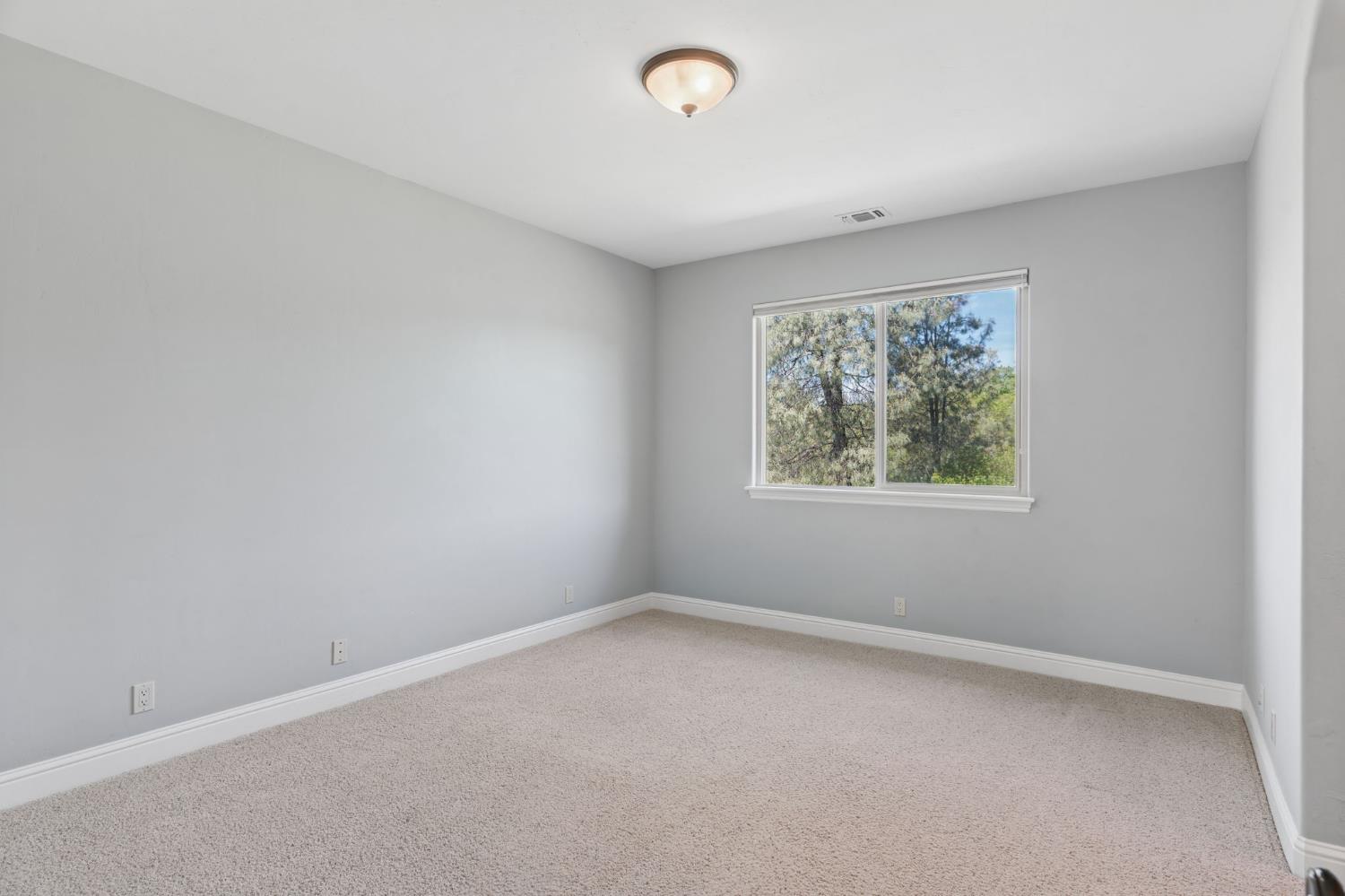 5180 Remuda Court Shingle Springs, CA 95682 - Photo 55 of 88 an empty room with windows