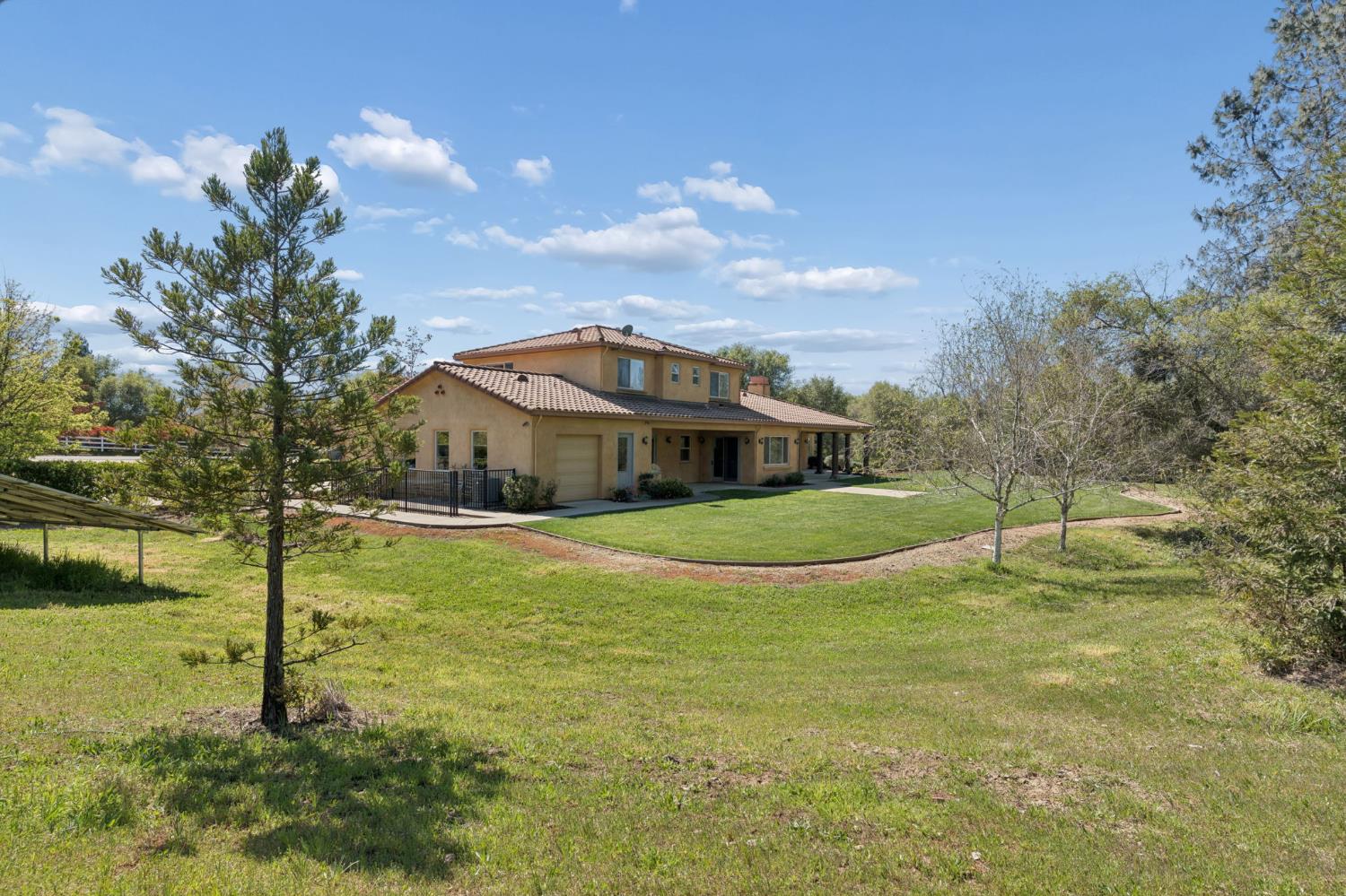 5180 Remuda Court Shingle Springs, CA 95682 - Photo 70 of 88 a view of a house with a yard