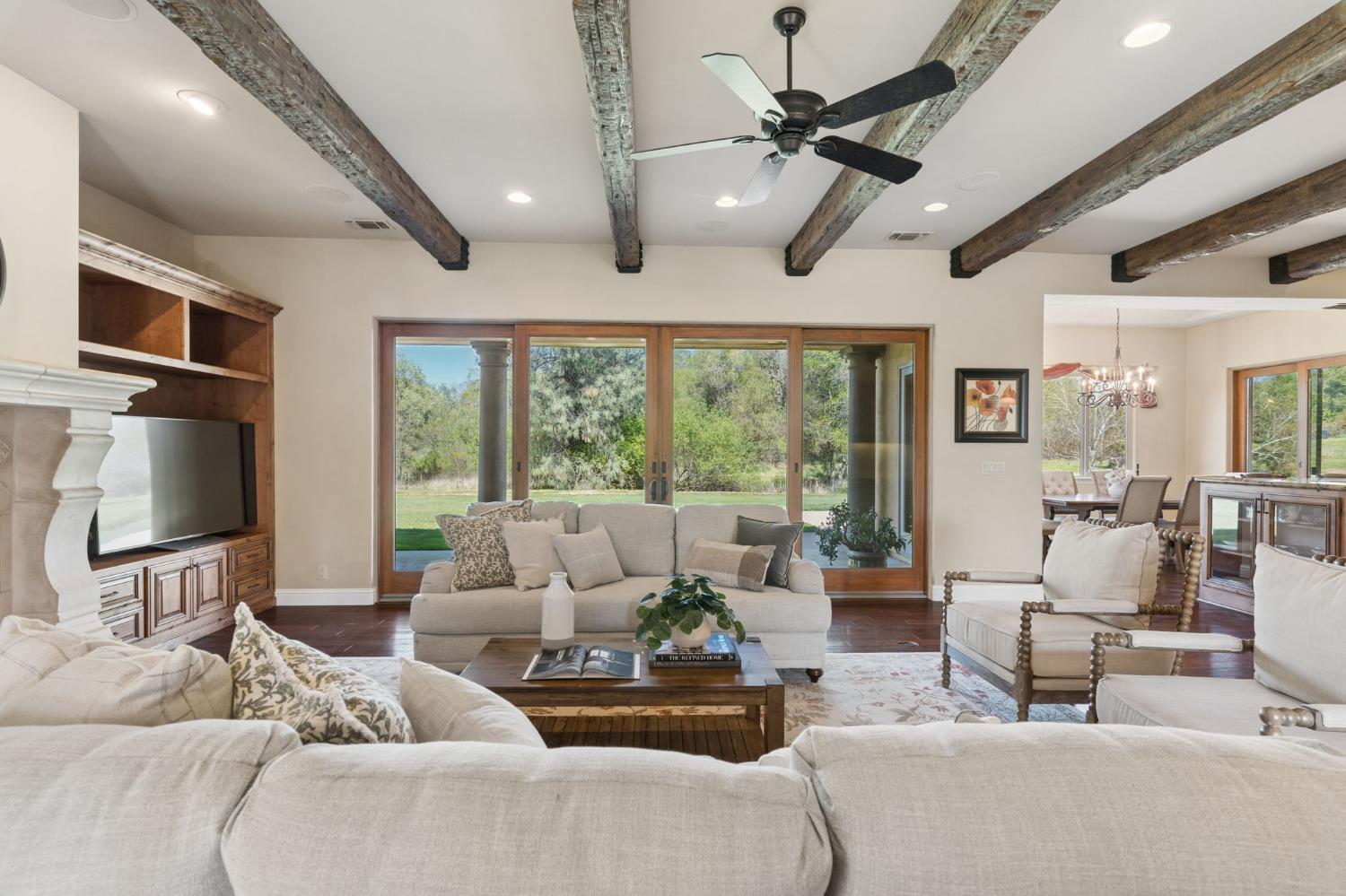 5180 Remuda Court Shingle Springs, CA 95682 - Photo 8 of 88 a living room with furniture and a flat screen tv
