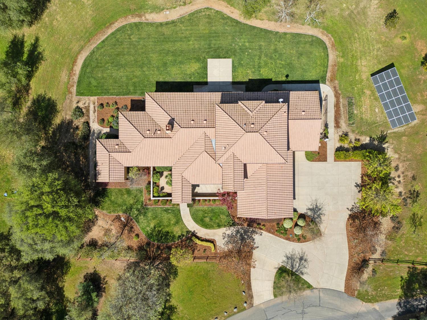 5180 Remuda Court Shingle Springs, CA 95682 - Photo 84 of 88 an aerial view of a house with a yard and lake view