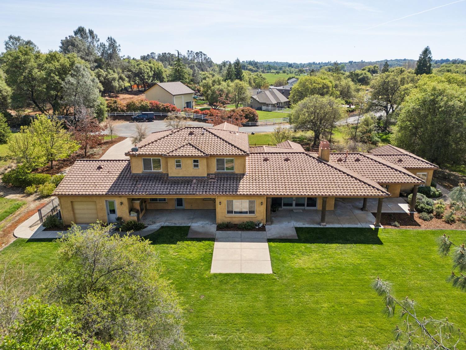 5180 Remuda Court Shingle Springs, CA 95682 - Photo 86 of 88 a aerial view of a house with swimming pool and a yard