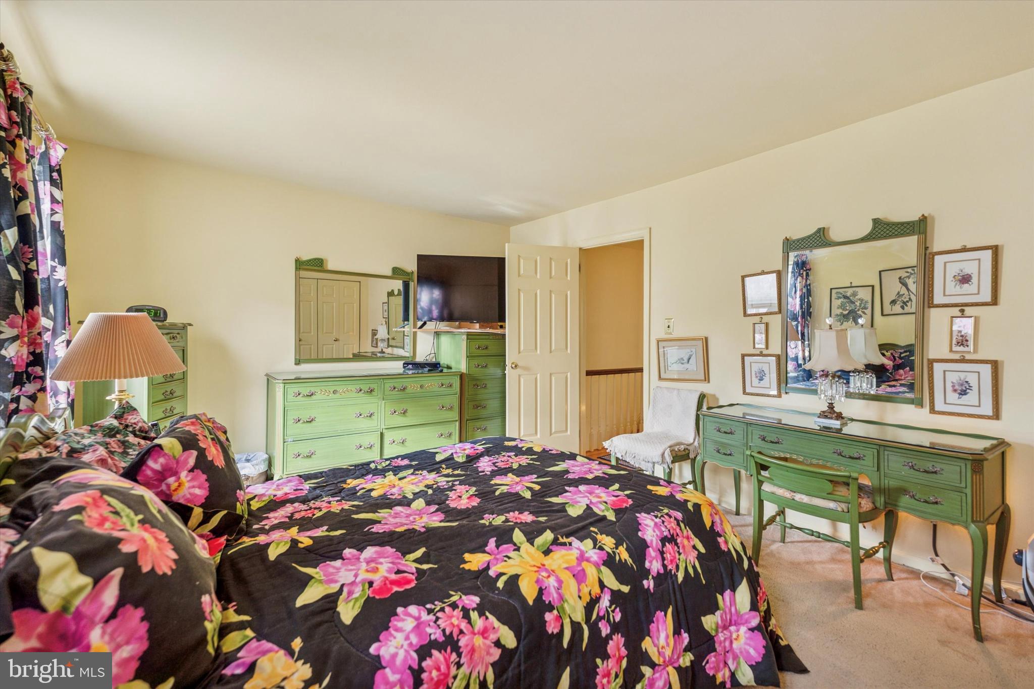 515 Conway Avenue Narberth, PA 19072 - Photo 19 of 27 a bedroom with a bed and a chandelier