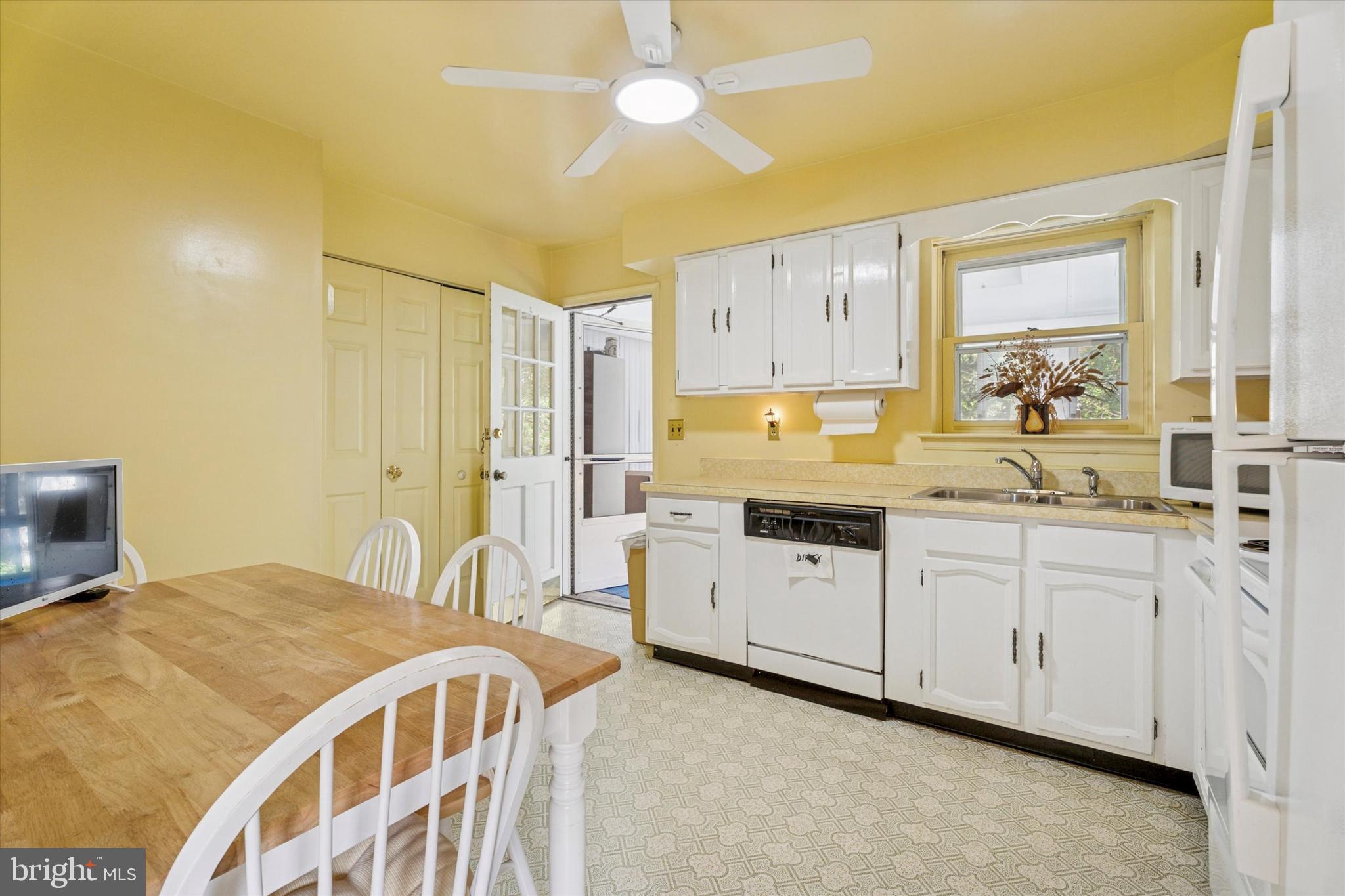 515 Conway Avenue Narberth, PA 19072 - Photo 8 of 27 a bedroom with a bed a chandelier and dresser