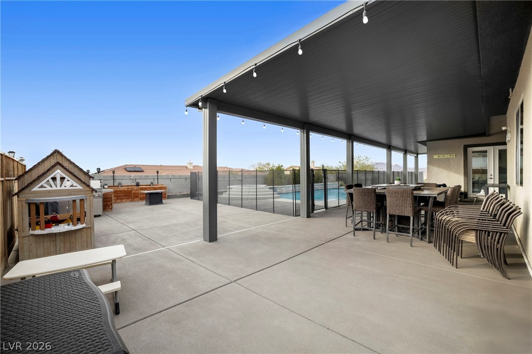432 North Racetrack Road Henderson, NV 89015 - Photo 25 of 45 Fenced backyard featuring a patio and french doors