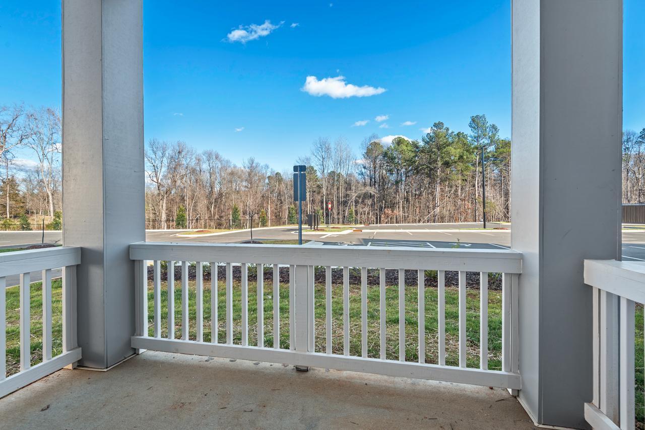 223 South Eleventh Street, Unit 103 Mebane, NC 27302 - Photo 3 of 41 a view of a porch with a backyard
