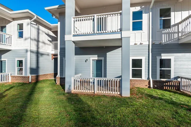 a view of a house with a deck