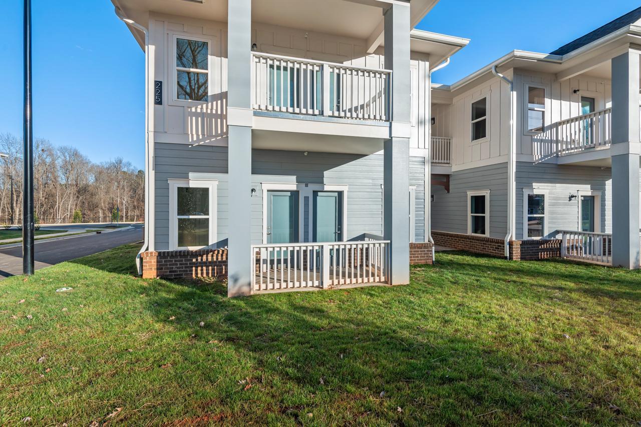223 South Eleventh Street, Unit 103 Mebane, NC 27302 - Photo 41 of 41 front view of a house with a yard