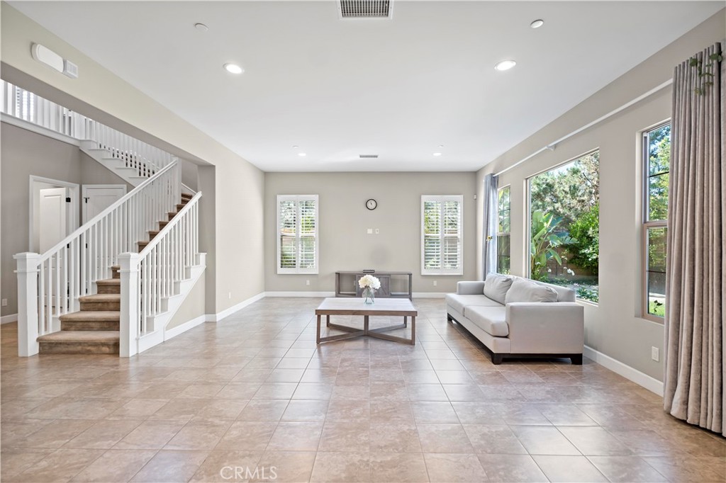 121 Paxton Irvine, CA 92620 - Photo 13 of 61 a living room with furniture and windows