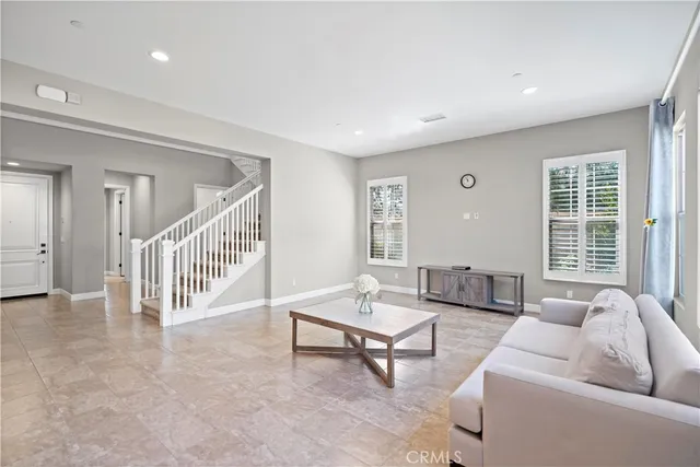 a large kitchen with granite countertop a large counter top and sink