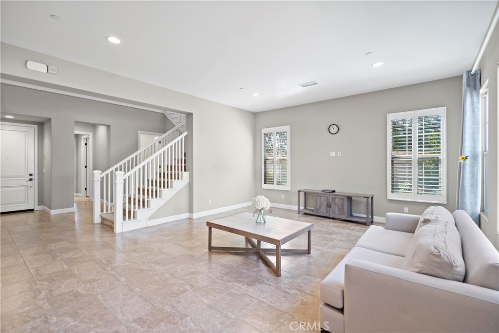 121 Paxton Irvine, CA 92620 - Photo 14 of 61 a living room with furniture and a window
