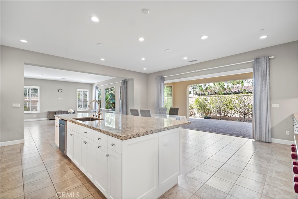 121 Paxton Irvine, CA 92620 - Photo 18 of 61 a large kitchen with granite countertop a large counter top and sink