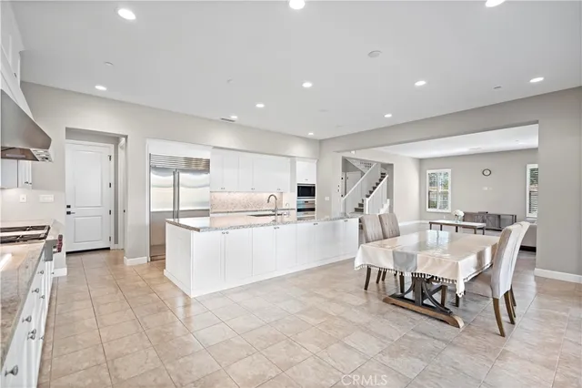 a view of entryway with stairs and wooden floor
