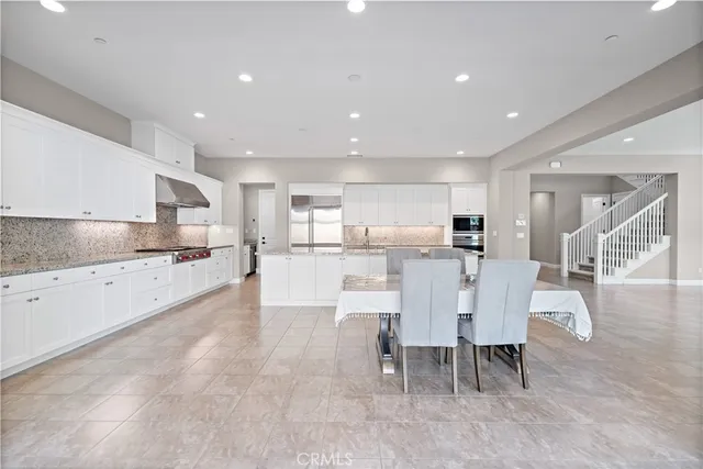 a view of a hallway with windows