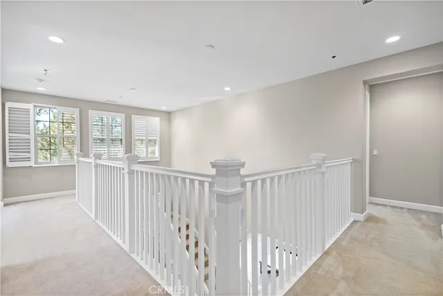 a room with a bed and a cabinets