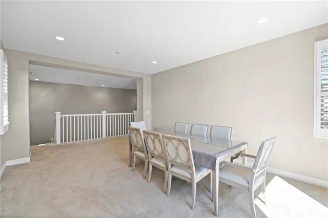 a bathroom with a toilet a sink and shower