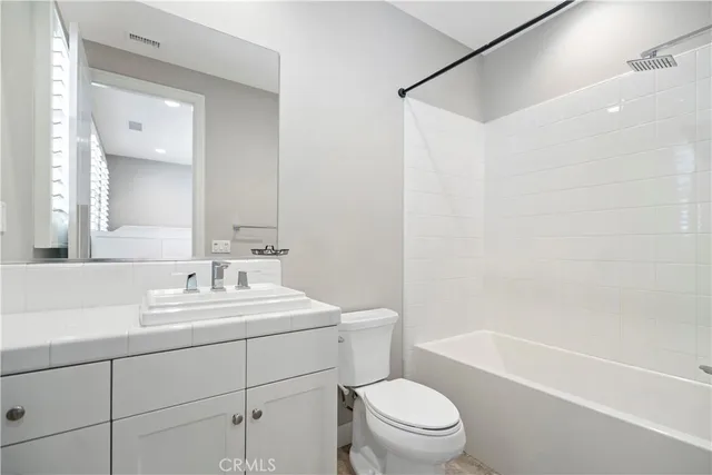 a room with a bed and window