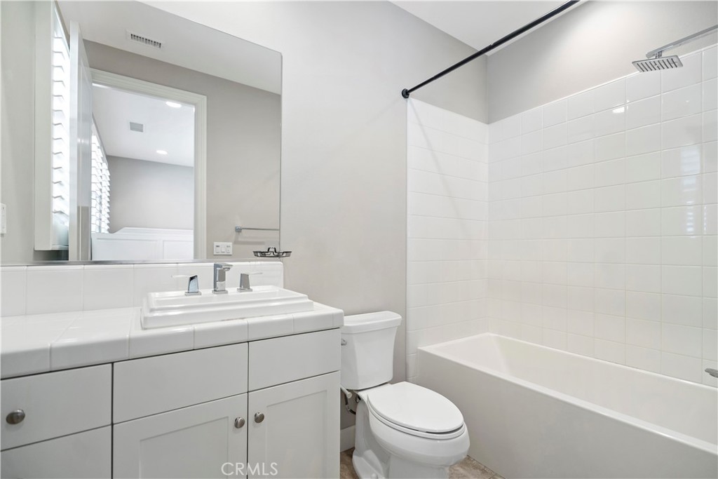 121 Paxton Irvine, CA 92620 - Photo 34 of 61 a bathroom with a sink a toilet and shower