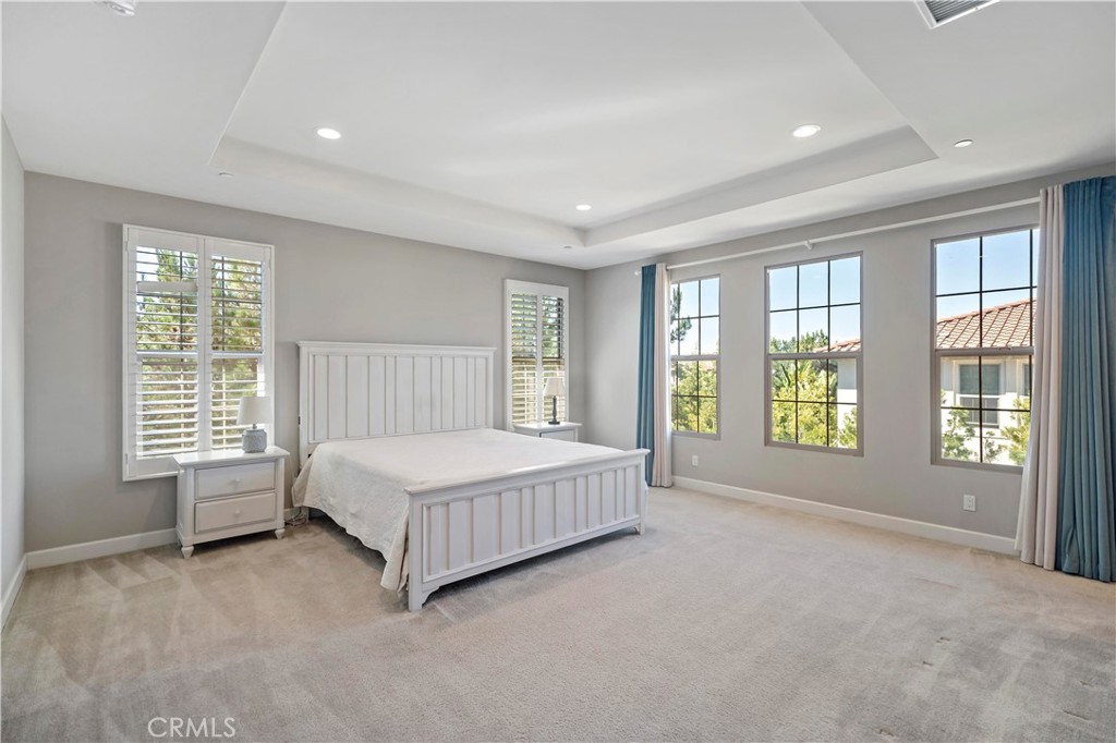 121 Paxton Irvine, CA 92620 - Photo 39 of 61 a spacious bedroom with a large bed and a large window