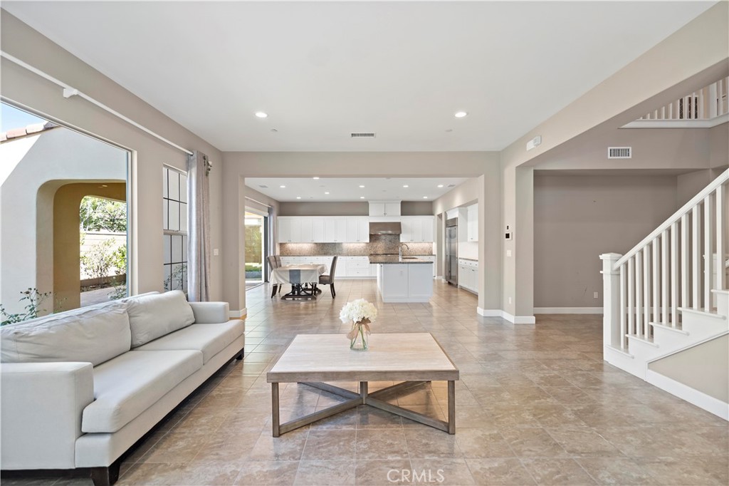 121 Paxton Irvine, CA 92620 - Photo 10 of 61 a living room with furniture and a large window