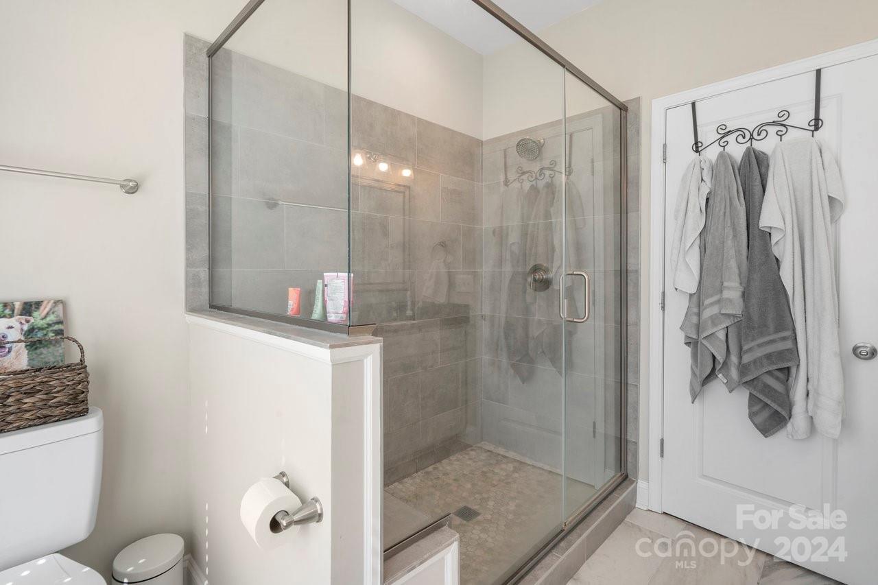 7609 Red Robin Trail Denver, NC 28037 - Photo 14 of 19 a bathroom with a shower and a sink