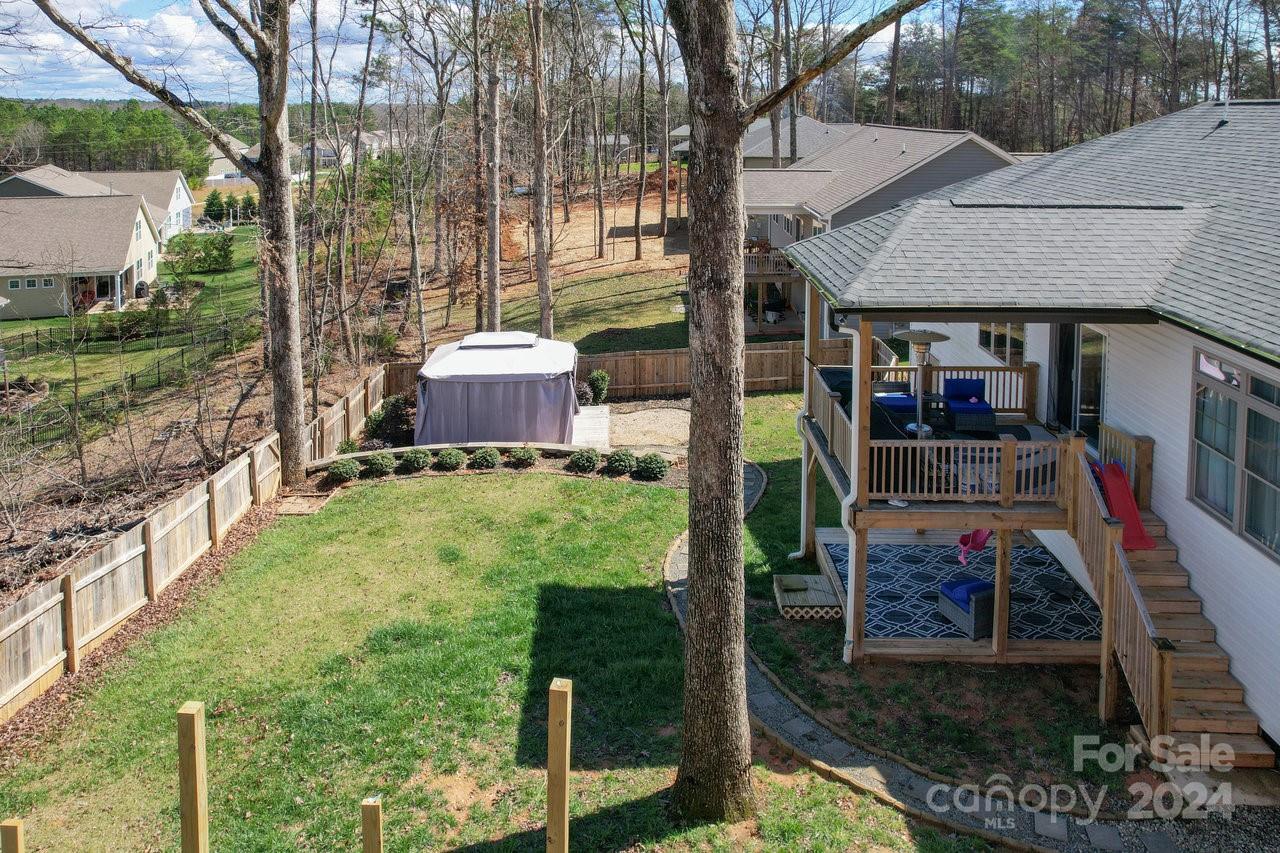 7609 Red Robin Trail Denver, NC 28037 - Photo 19 of 19 a front view of a house with a yard