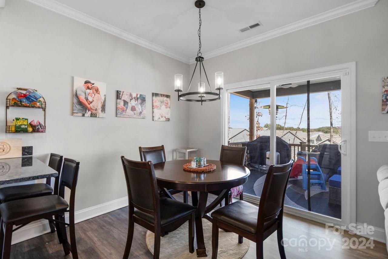 7609 Red Robin Trail Denver, NC 28037 - Photo 8 of 19 a view of a dining room with furniture window and outside view