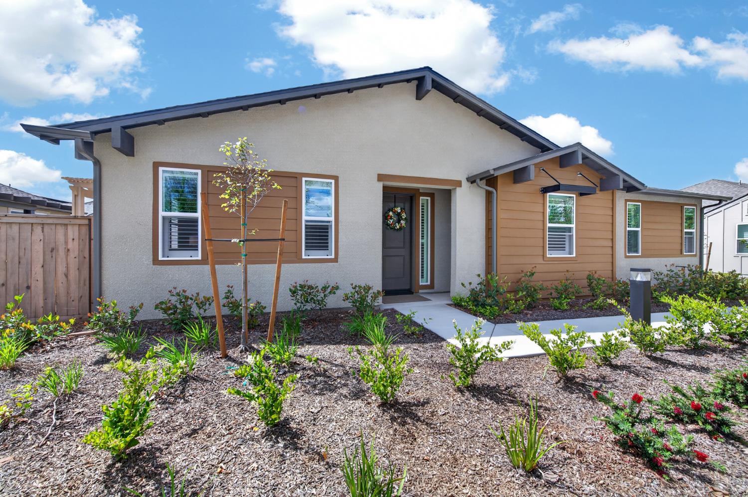 4185 Ryan Lane Madera, CA 93636 - Photo 16 of 63 a front view of a house with garden