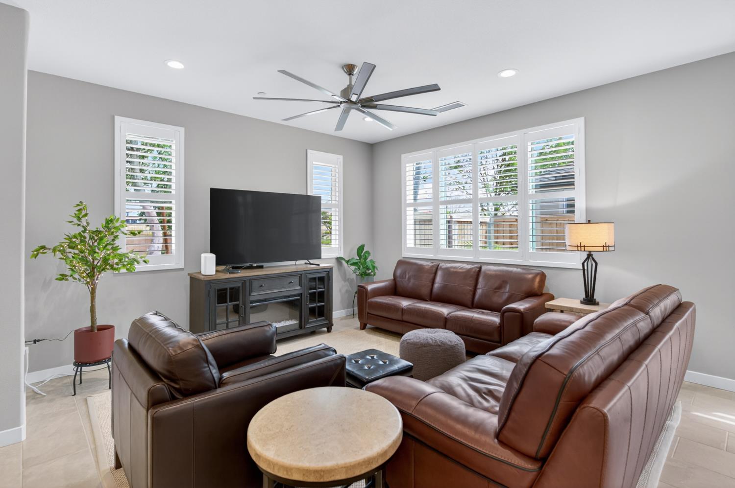4185 Ryan Lane Madera, CA 93636 - Photo 18 of 63 a living room with furniture a flat screen tv and a window