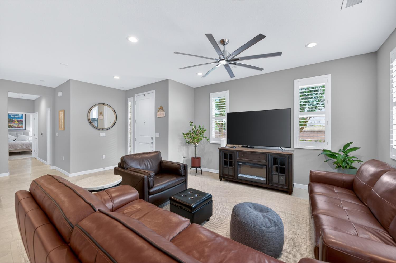 4185 Ryan Lane Madera, CA 93636 - Photo 19 of 63 a living room with furniture and a flat screen tv