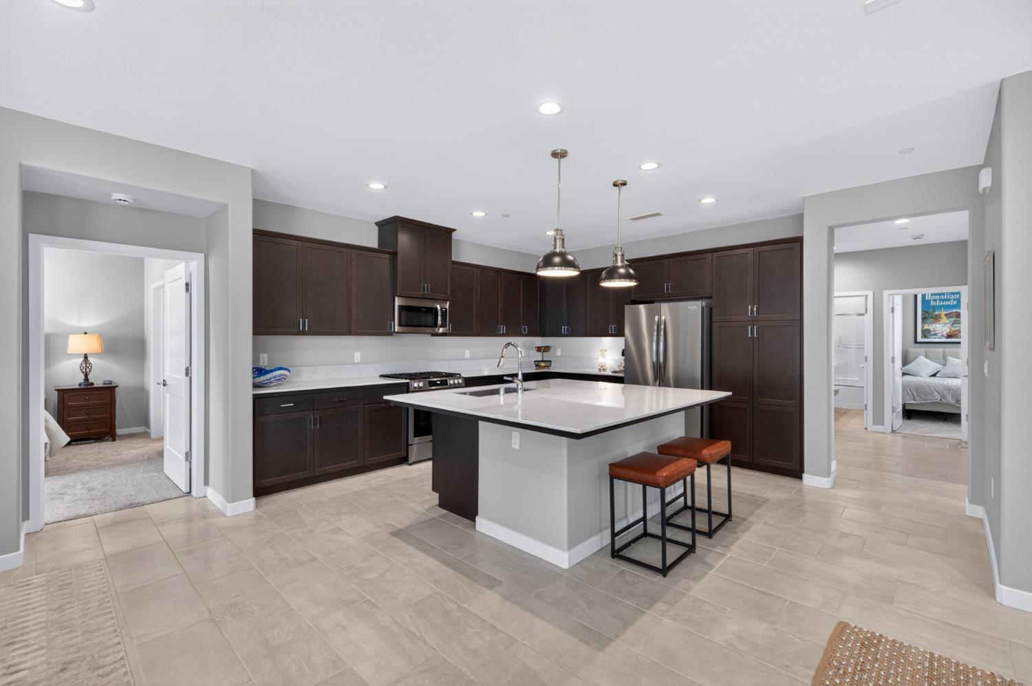 4185 Ryan Lane Madera, CA 93636 - Photo 22 of 63 a large kitchen with a sink and a large cabinets