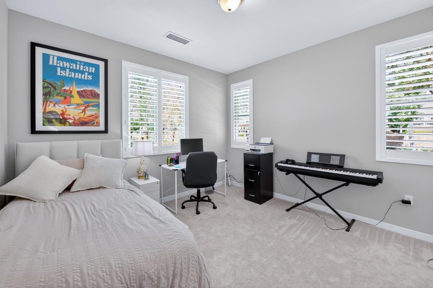 4185 Ryan Lane Madera, CA 93636 - Photo 30 of 63 a bedroom with a bed and a furniture