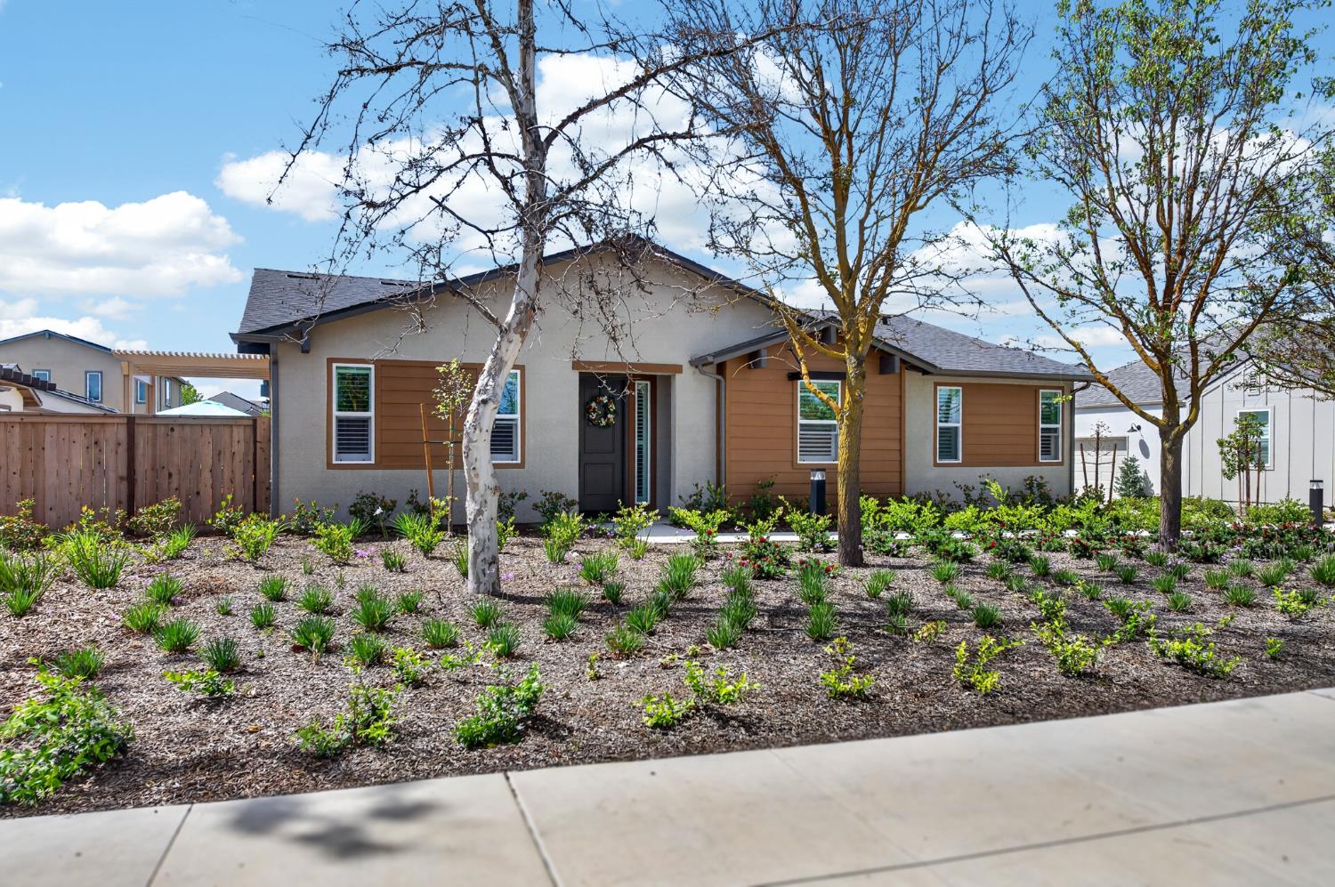 4185 Ryan Lane Madera, CA 93636 - Photo 3 of 63 front view of a house with a bench