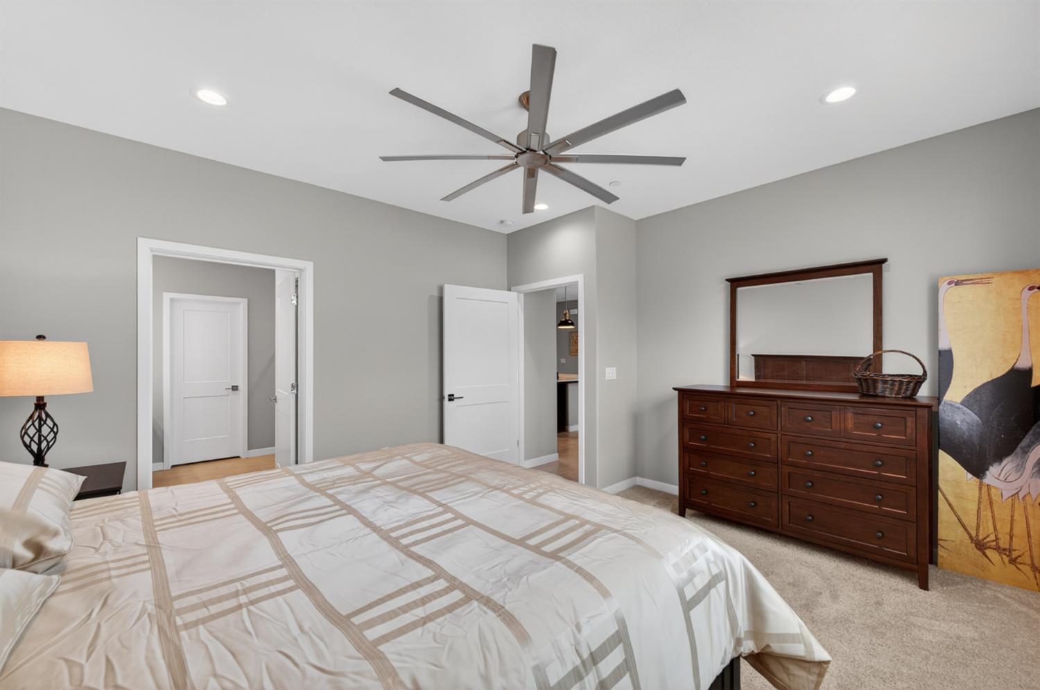 4185 Ryan Lane Madera, CA 93636 - Photo 34 of 63 a bedroom with a bed and a chandelier