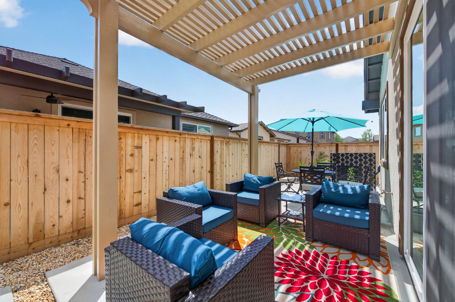 4185 Ryan Lane Madera, CA 93636 - Photo 40 of 63 a outdoor space with patio couch and wooden floor