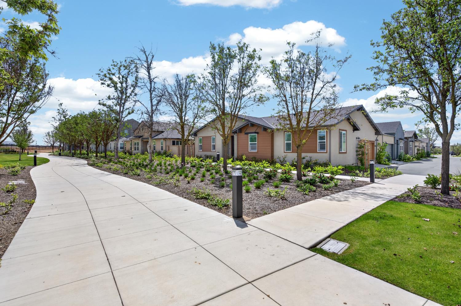 4185 Ryan Lane Madera, CA 93636 - Photo 4 of 63 a front view of a house with a yard