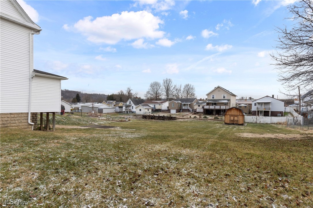 1011 Parriott Avenue Moundsville, WV 26041 - Photo 34 of 44 View of yard with a residential view and a shed