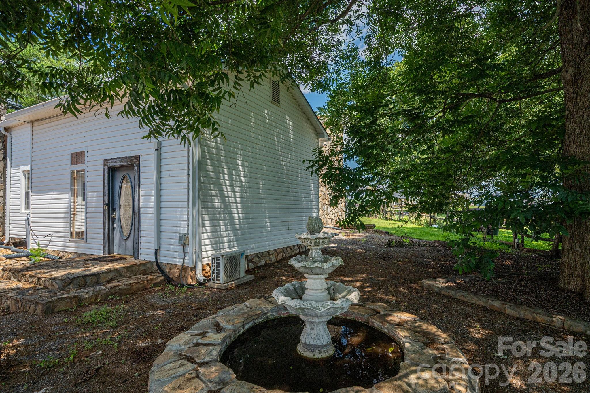 1387 George Brown Road Crouse, NC 28033 - Photo 38 of 48 a backyard of a house with yard and outdoor seating