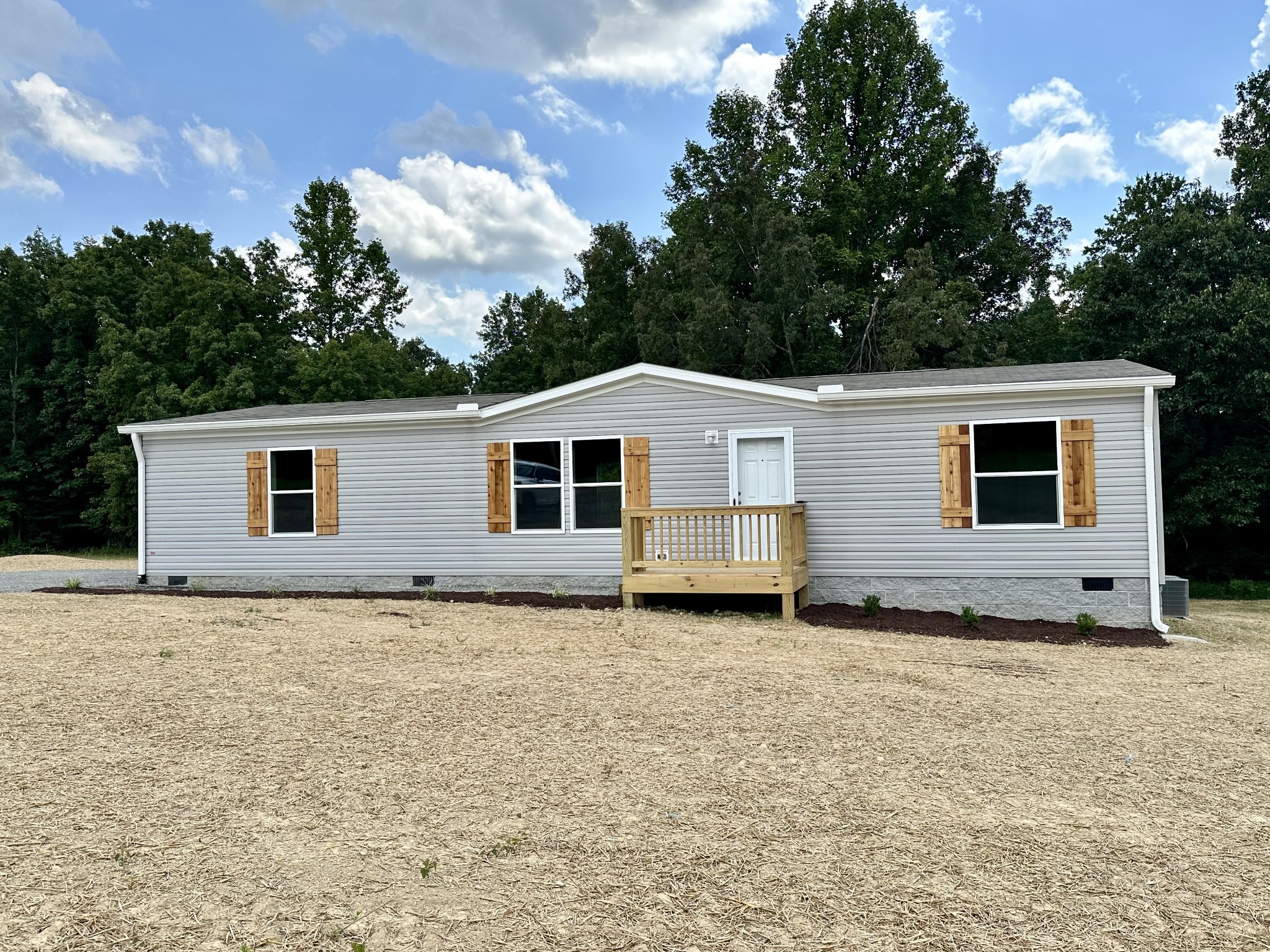 1671 Rabe Coats Road Westmoreland, TN 37186 - Photo 2 of 15 a view of a house with a backyard