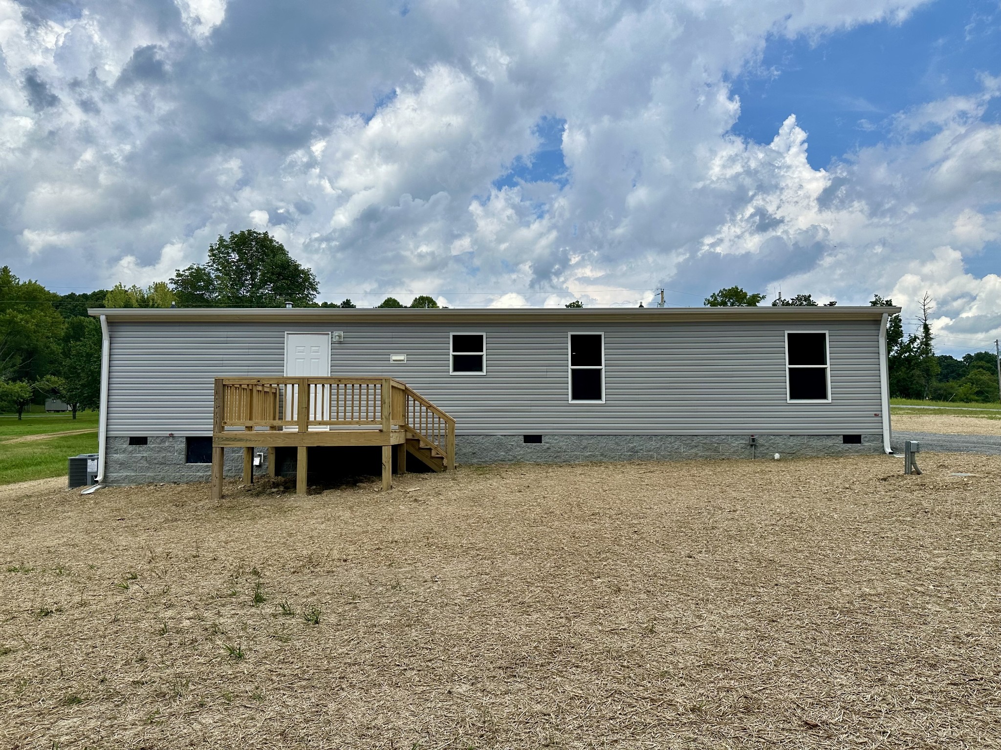 1671 Rabe Coats Road Westmoreland, TN 37186 - Photo 4 of 15 a view of a house with backyard