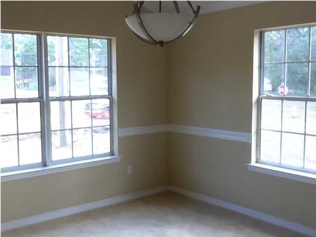 30 4th Street Santa Rosa Beach, FL 32459 - Photo 21 of 23 an empty room with windows