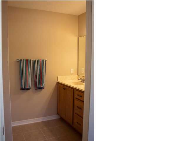 30 4th Street Santa Rosa Beach, FL 32459 - Photo 22 of 23 a bathroom with a sink and a mirror