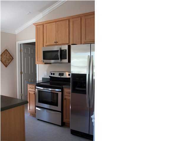 30 4th Street Santa Rosa Beach, FL 32459 - Photo 8 of 23 a kitchen with a sink and stainless steel appliances